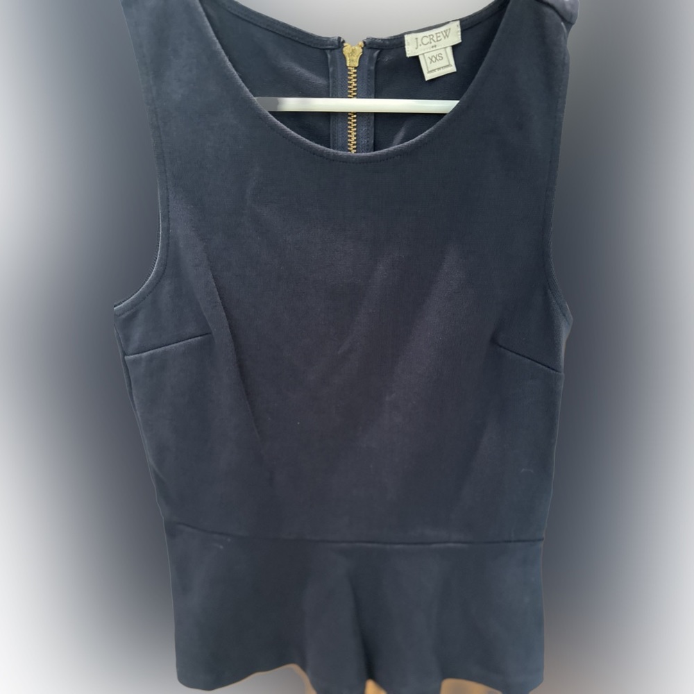 J. Crew peplum sleeveless top.